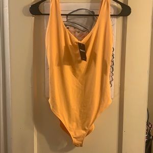 BUTTERCUP YELLOW  BRAND NEW NWT BODYSUIT Sold**